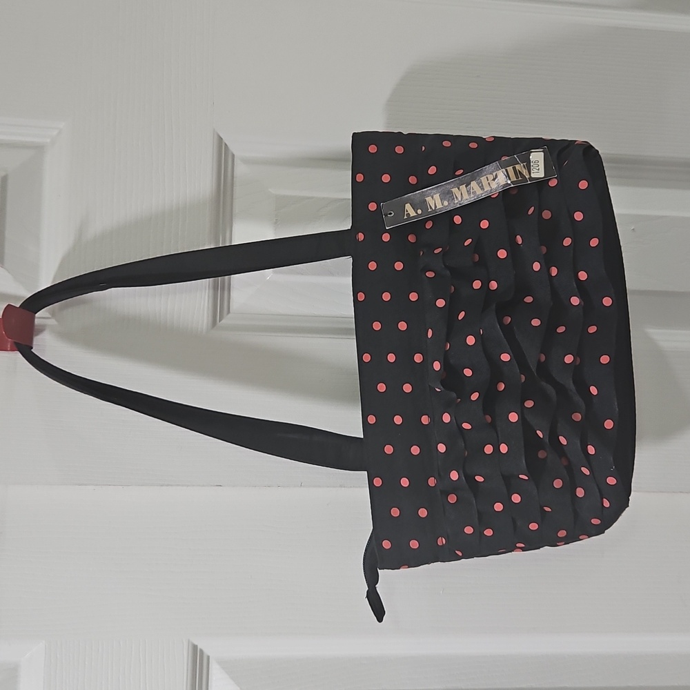 Black W/ pink polka dotted purse